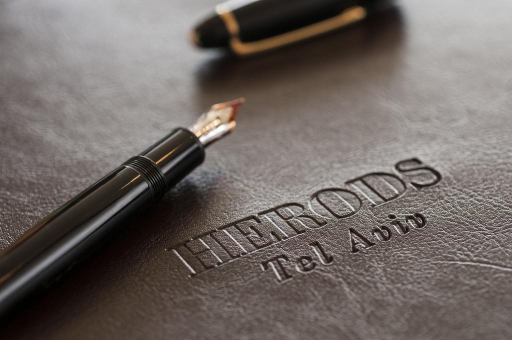 Herods Tel Aviv By The Beach Экстерьер фото The name of the firm engraved on a leather portfolio